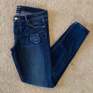 Bebe low rise lightly distressed skinny jeans